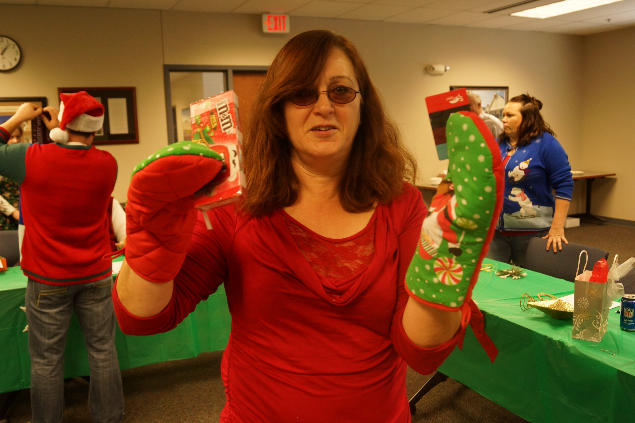 Irene receives gifts at a staff holiday party.